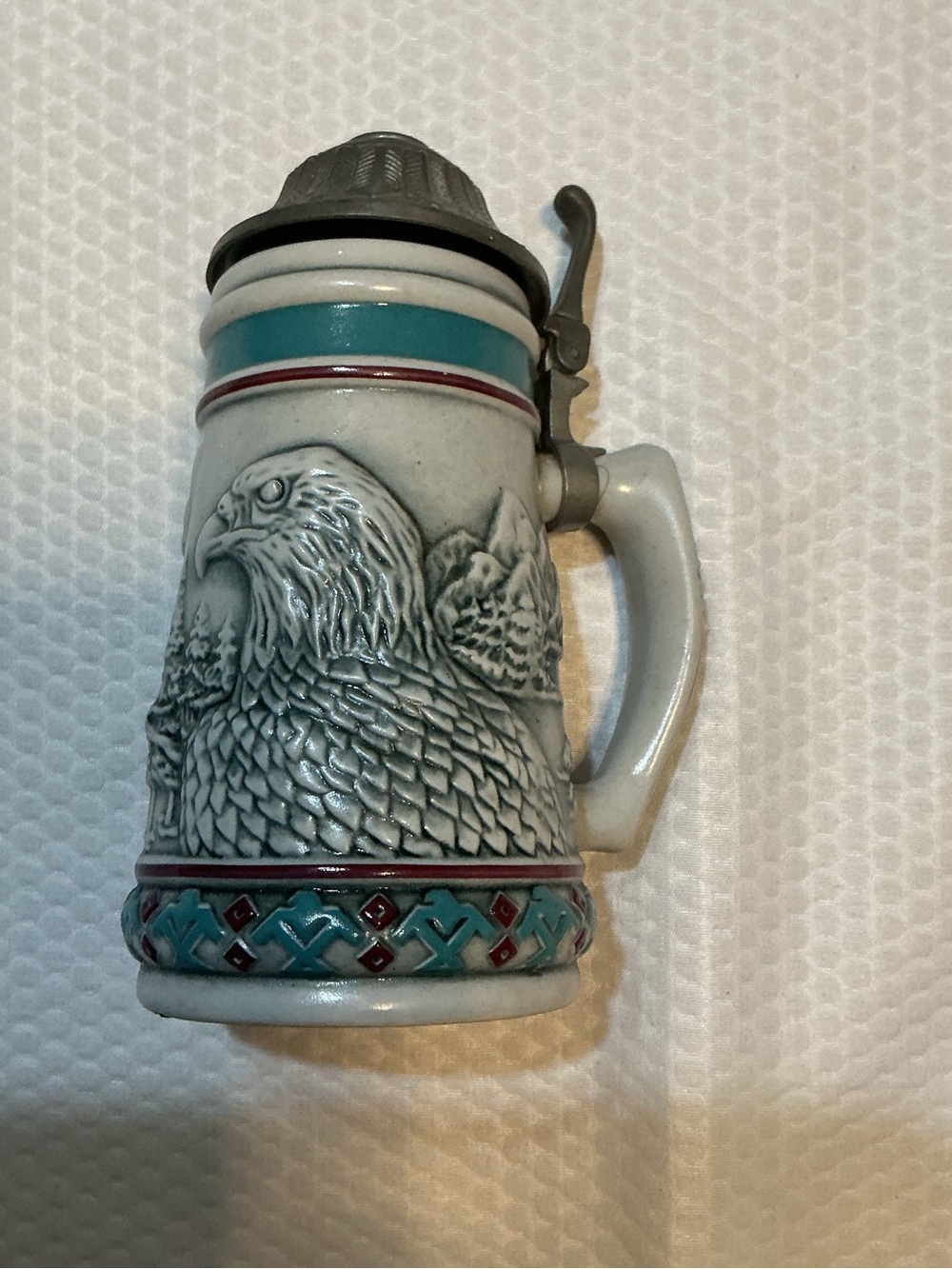 Vintage 1990 Avon Ceramic Mug with White and Teal Markings